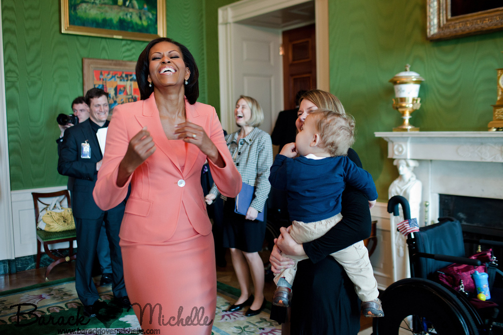 michelle peach suit laughing